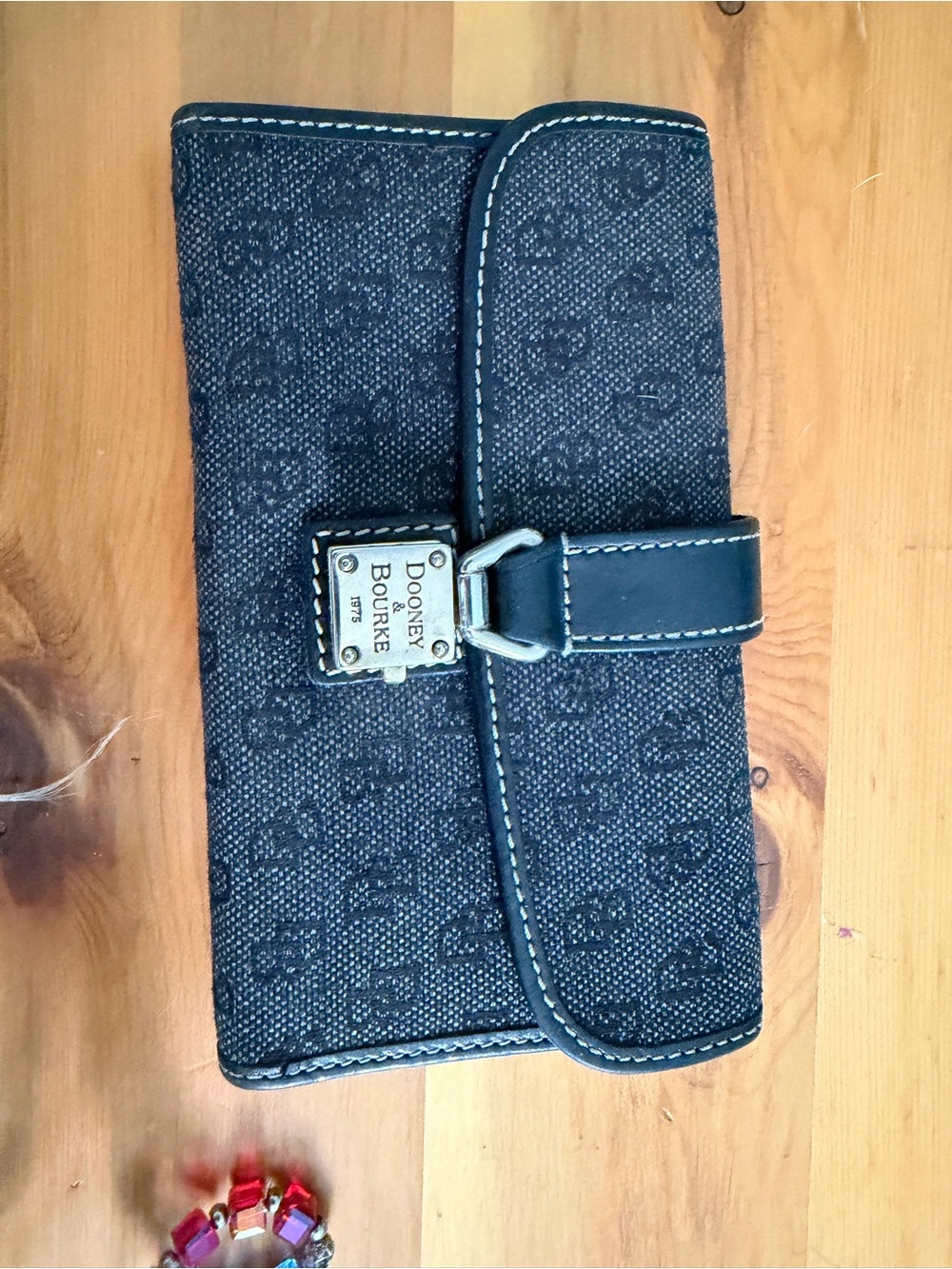 Authentic Dooney & Bourke Black Monogram Snap Wallet with Buckle Plate